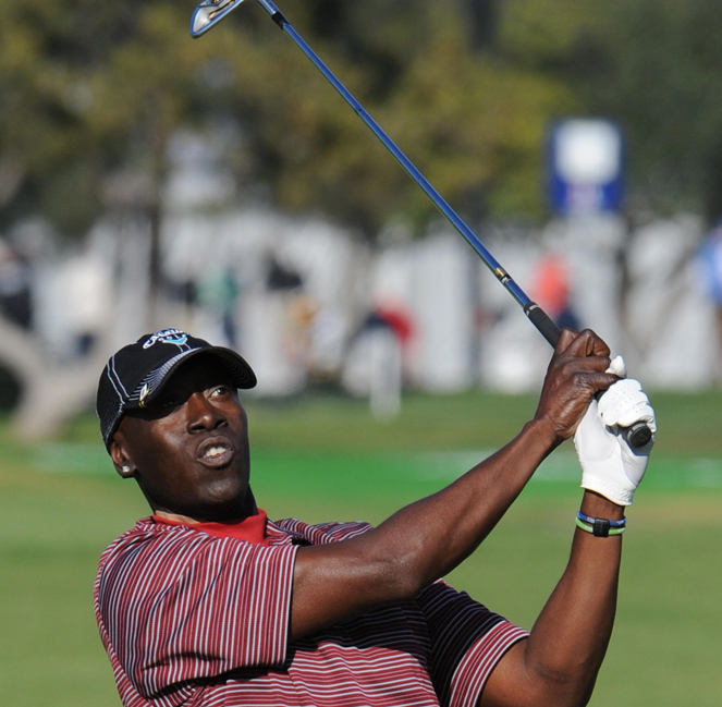 Actor Don Cheadle watches his approach s