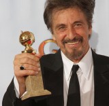 Actor Al Pacino poses with his award for