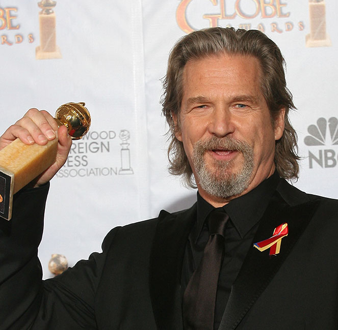 Jeff Bridges celebrates winning the best