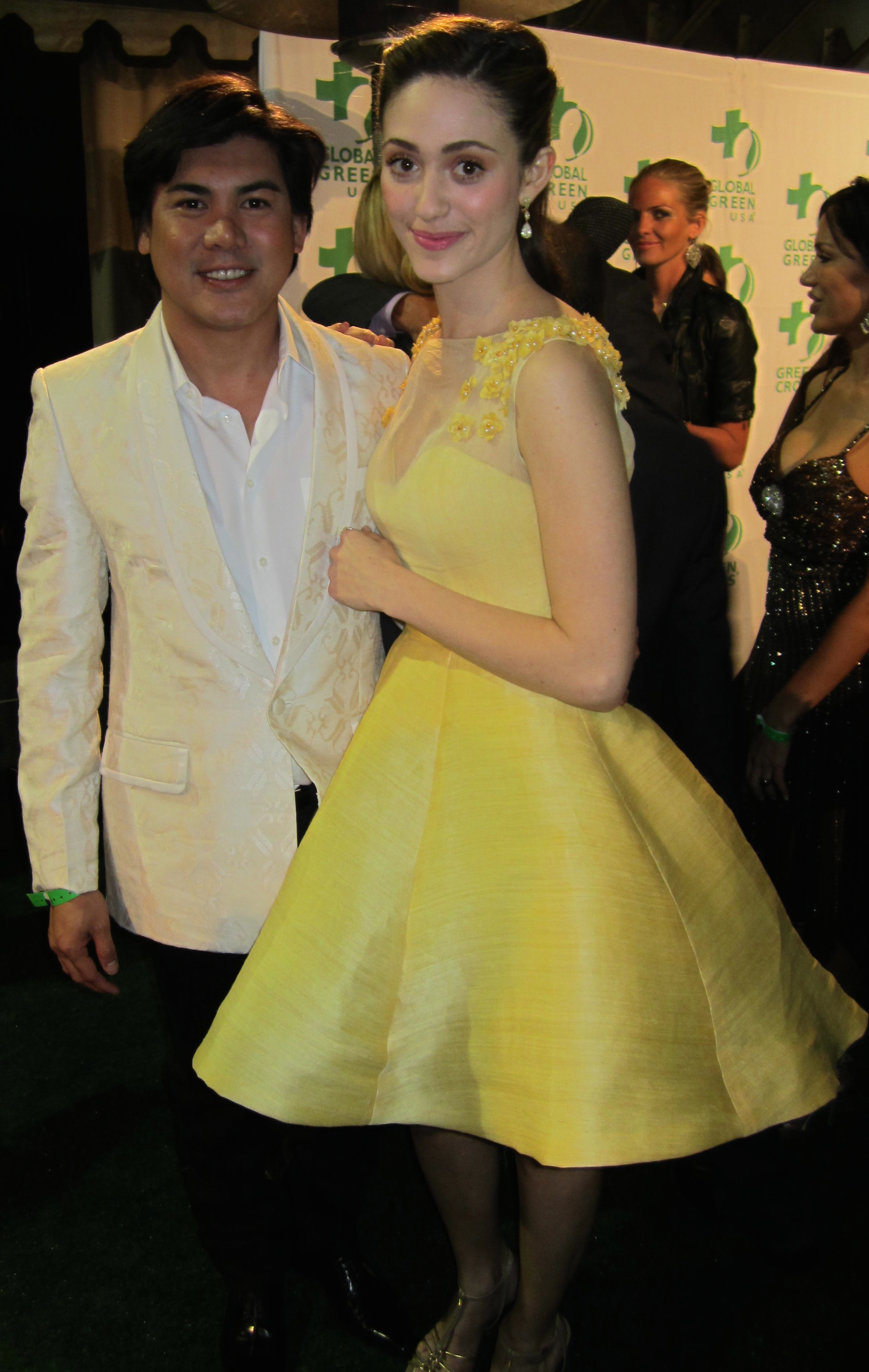 Oliver with Emmy Rossum in his dress at Pre-Oscar party 2012
