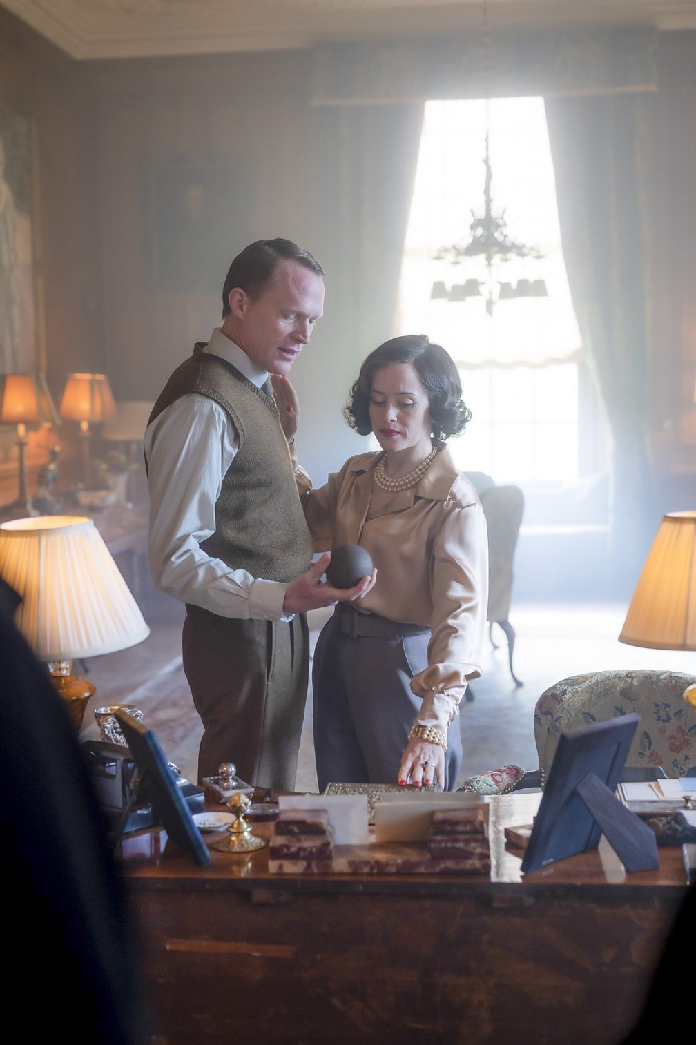 Claire Foy and Paul Bettany in “A Very British Scandal"
