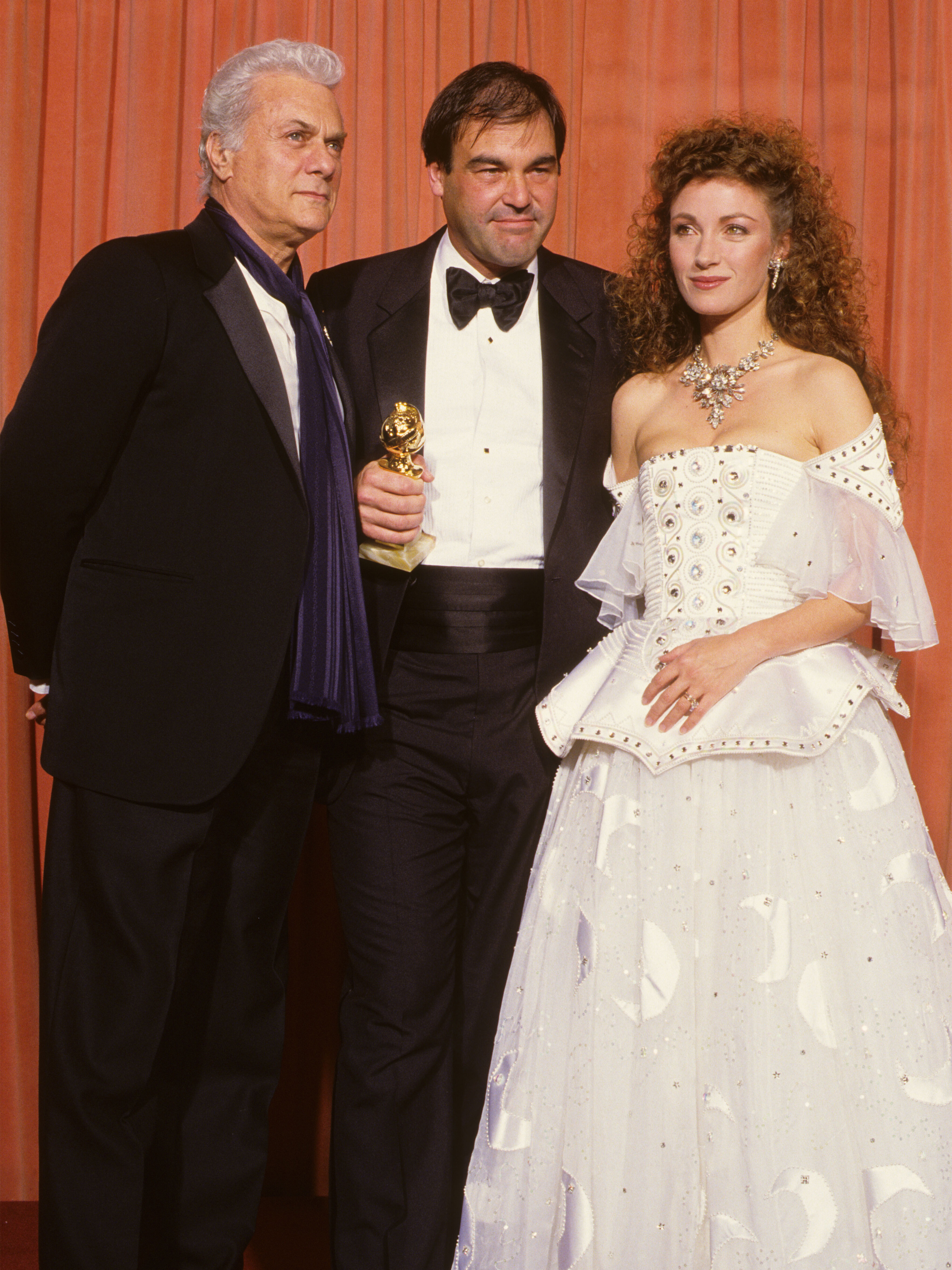 1987 Oliver Stone, Tony Curtis, and Jane Seymour, 44th Golden Globes