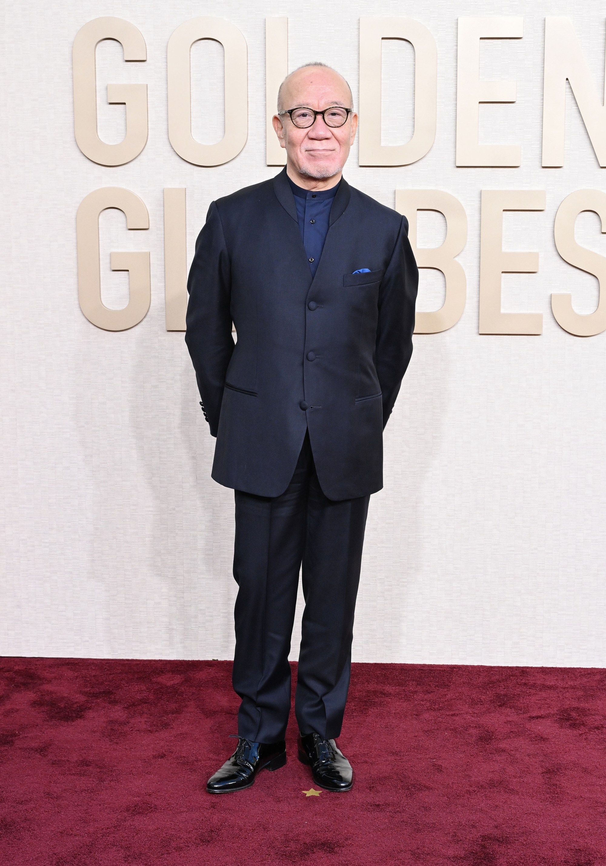 Composer Joe Hisaishi arrives at the Red Carpet at the 81st Golden Globe  Awards - Golden Globes