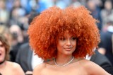 Cannes fest-goer sports full, lush curls - the perfect foil to intemperate weather.