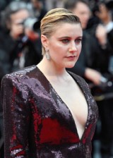 Greta Gerwig is the epitome of power at the opening ceremony of the 2024 Cannes Film Festival. The director donned an eggplant, sequined St Laurent with plunging neckline and shoulder emphasize.