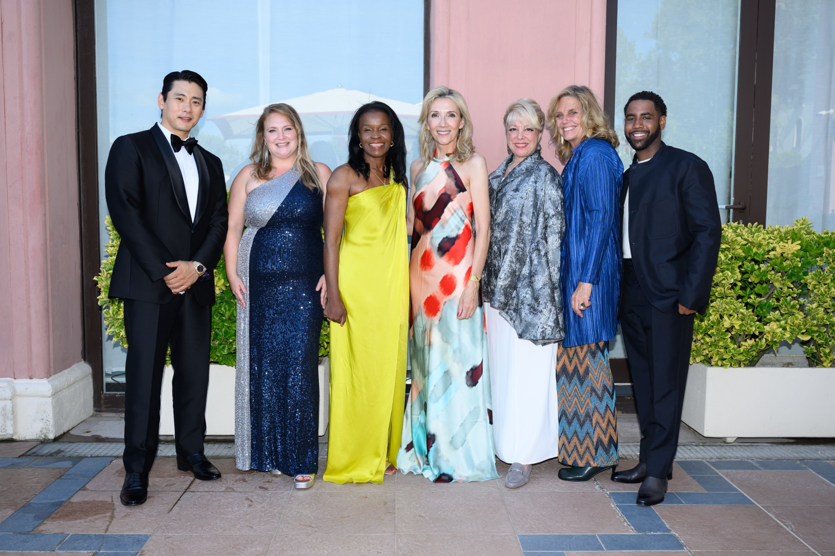 Teo Yoo (left), Danielle Turkov Wilson, Misan Sagay, Helen Hoehne, Jeanine Jackson, Geralyn White Dreyfous, Jharrel Jerome
